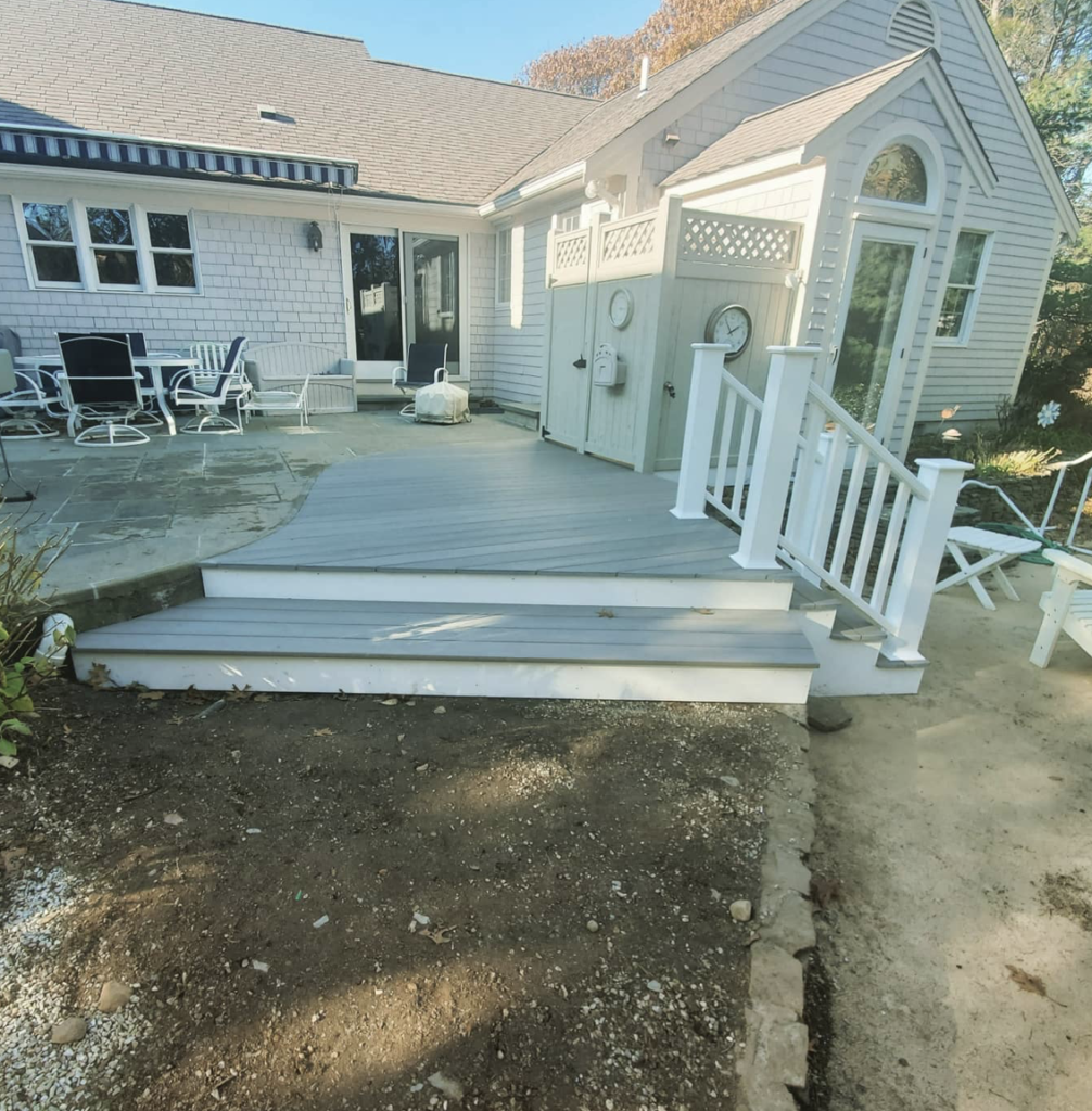 a house with a deck and patio